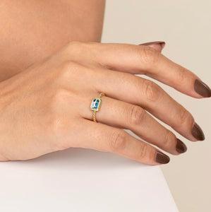 14k Yellow Gold Blue Topaz Ring