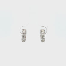 Load and play video in Gallery viewer, 14k White Gold Diamond Huggie Earrings
